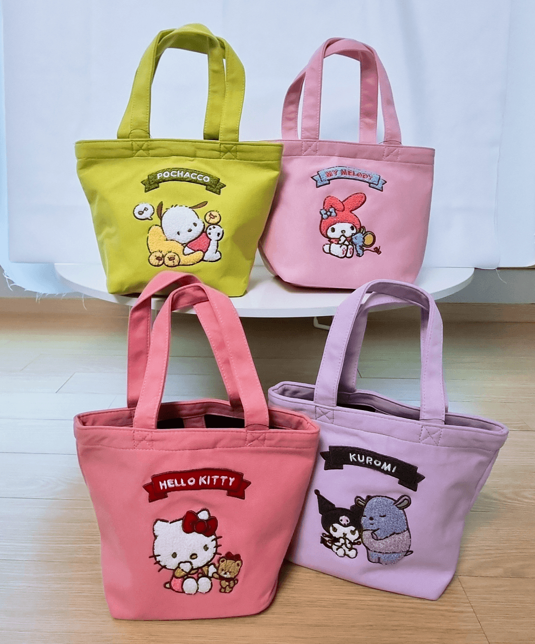 산리오 손가방 미니 토트백 헬로키티 마이멜로디 쿠로미 포차코